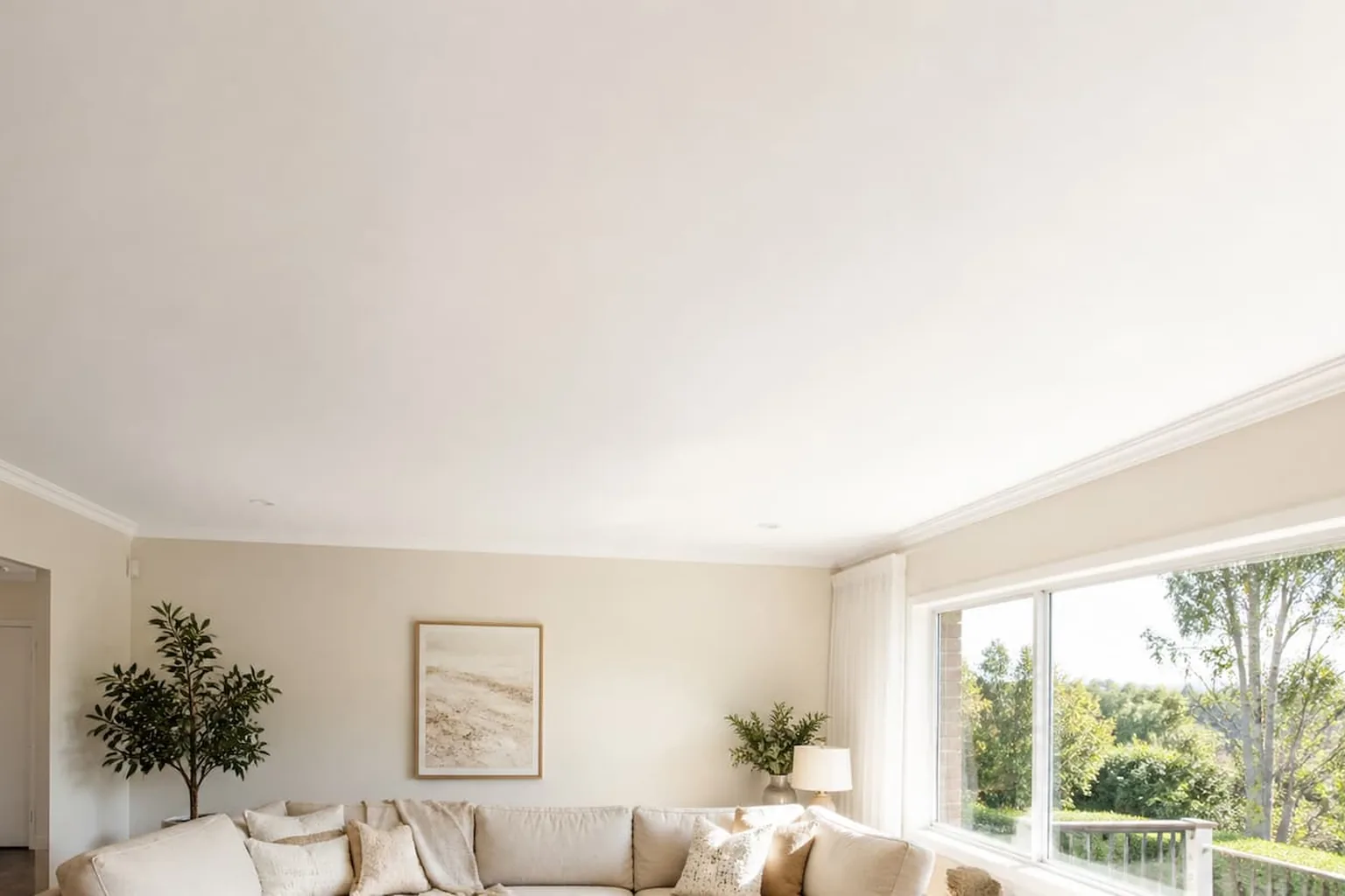 A finished ceiling in a Perth living room, flat and clean across the whole span