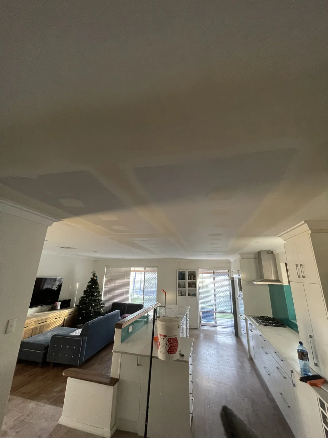 Fresh compound along the ceiling joins over a kitchen and living area in East Perth
