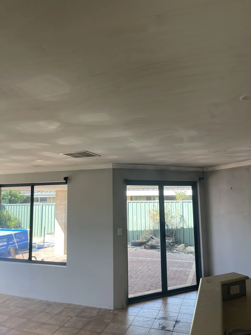 New ceiling running over the dining area and sliding doors in Rockingham