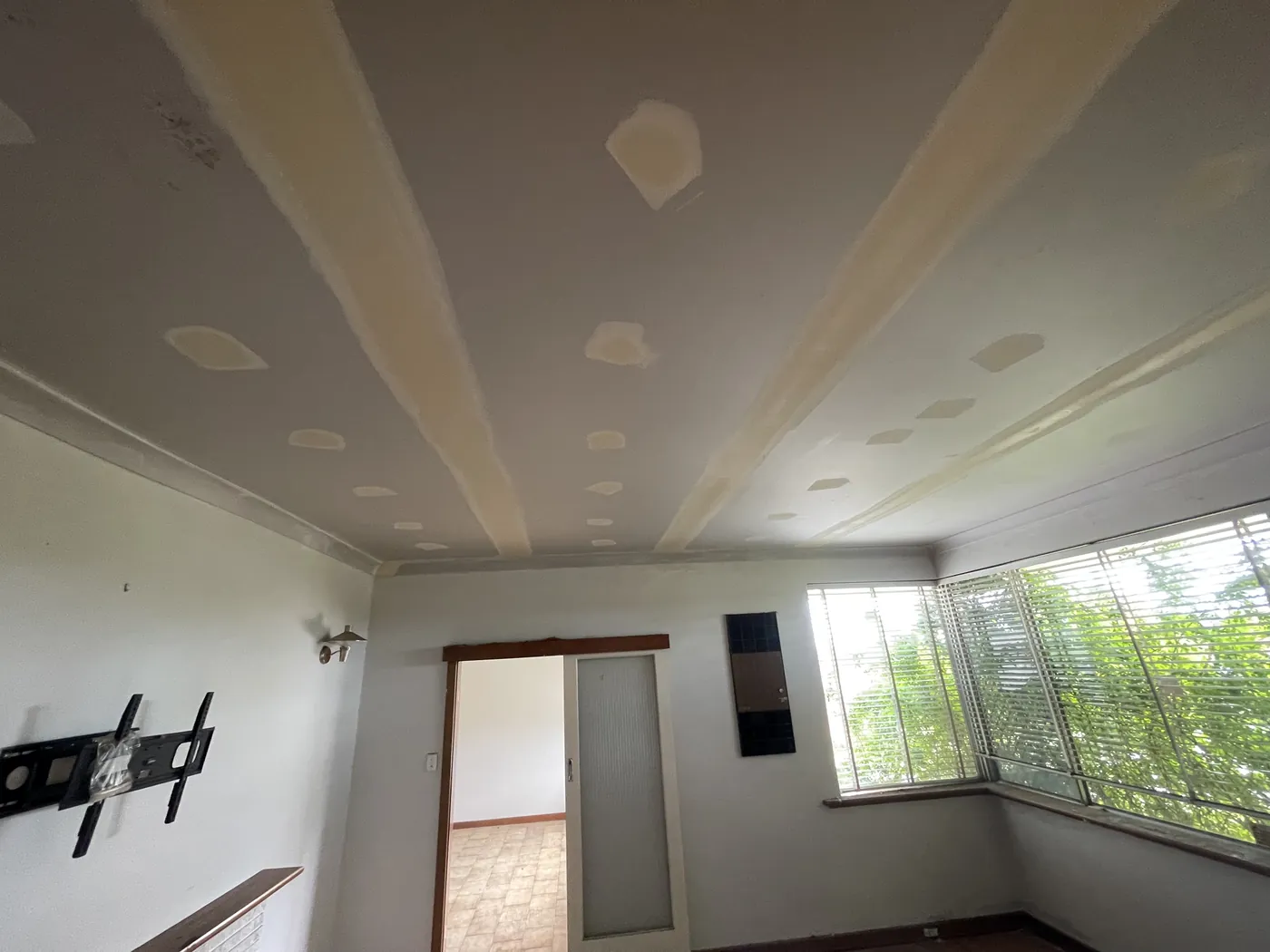 New plasterboard ceiling with flushed joins in a bright Scarborough room