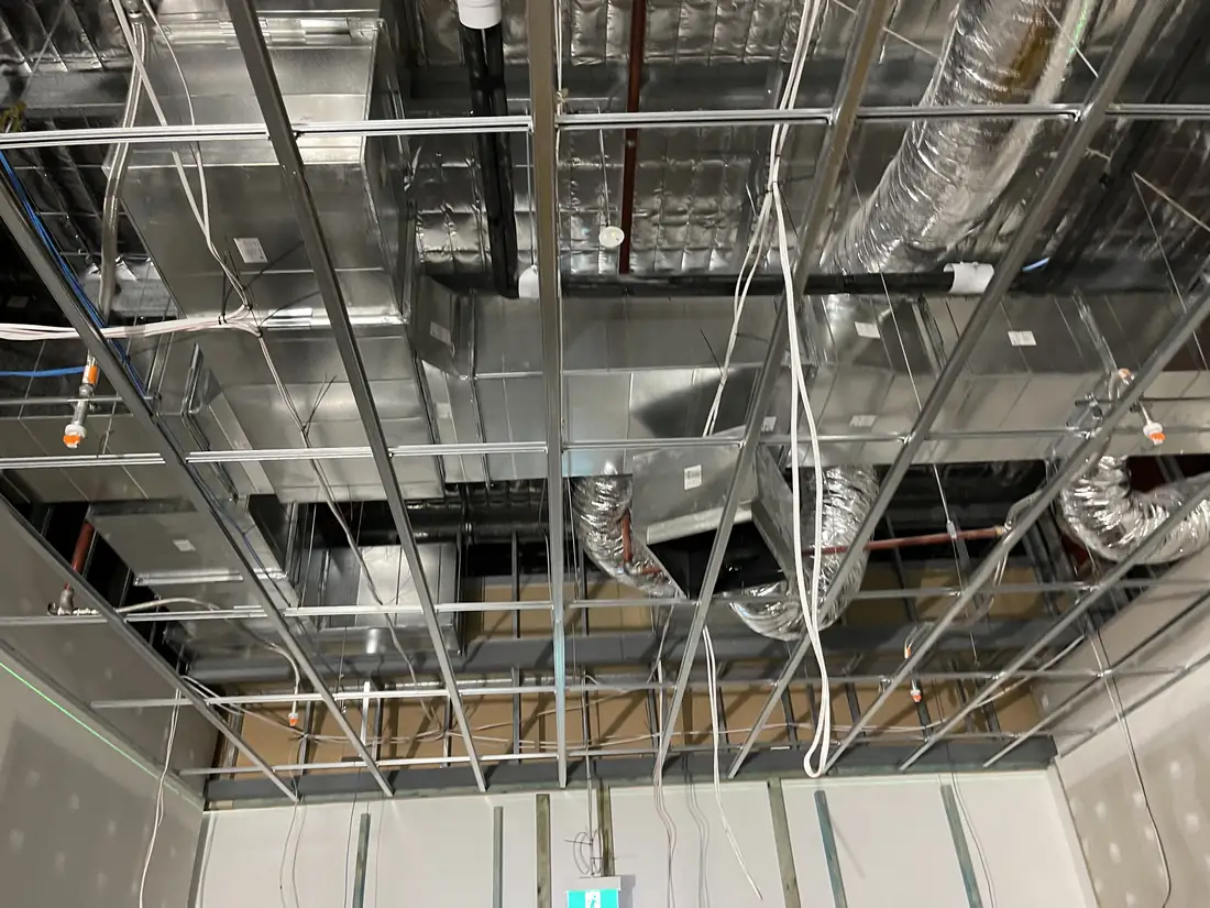 Ceiling frame, ducts and cabling open before the plasterboard went up in a Perth CBD fit-out