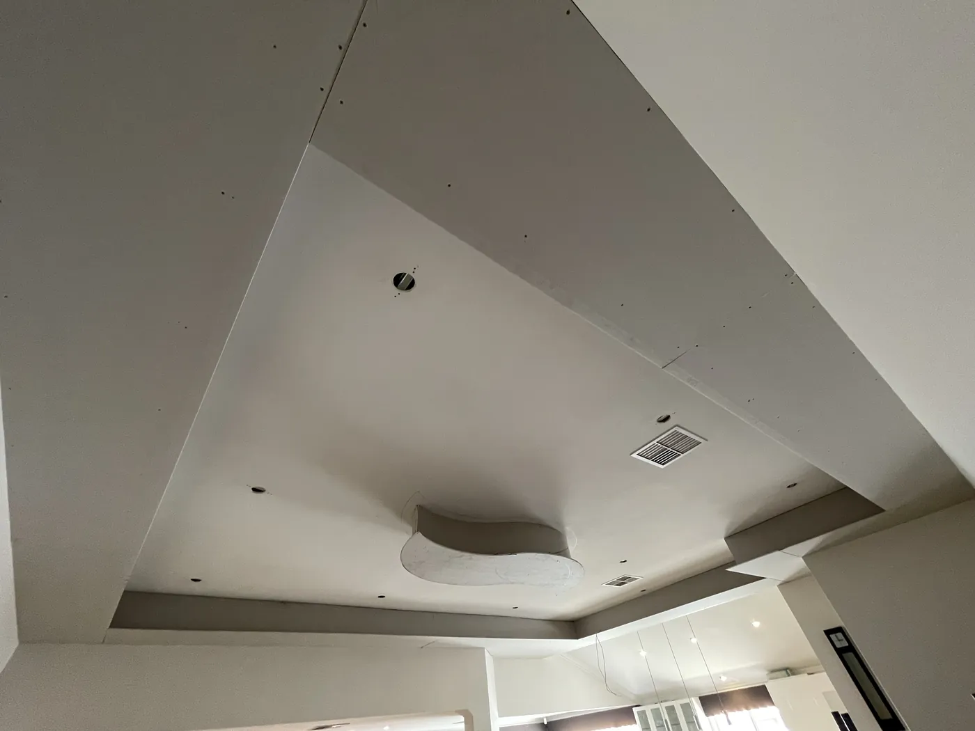Close view of the new recessed ceiling feature and light holes in Clarkson