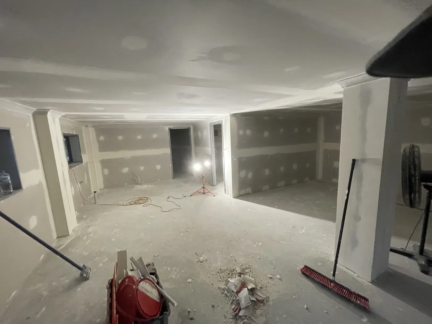 Open-plan room in Stirling with new plasterboard ceiling and walls part flushed