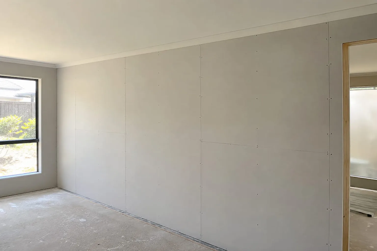 Gyprock walls and ceiling sheeted out and set ready for paint